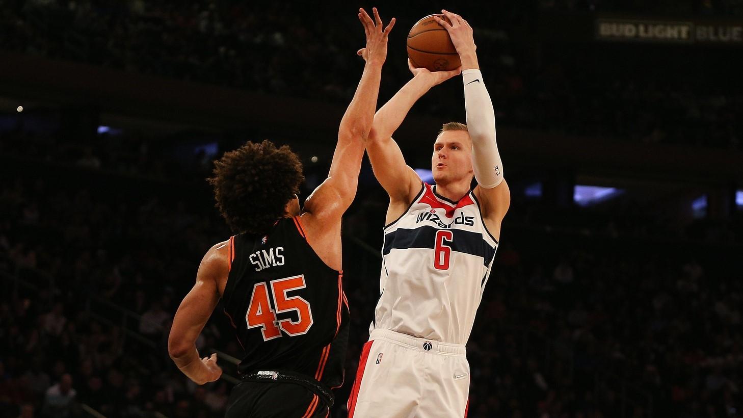 Mar 18, 2022; New York, New York, USA; Washington Wizards center Kristaps Porzingis (6) takes a shot against New York Knicks forward Jericho Sims (45) during the first half at Madison Square Garden. / Andy Marlin-USA TODAY Sports