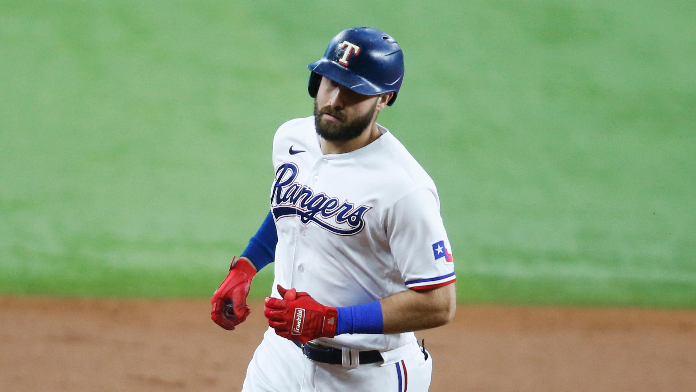 Jul 10, 2021; Arlington, Texas, USA; Texas Rangers designated hitter Joey Gallo (13) rounds the bases after a home run in the first inning against the Oakland Athletics at Globe Life Field. / Tim Heitman-USA TODAY Sports