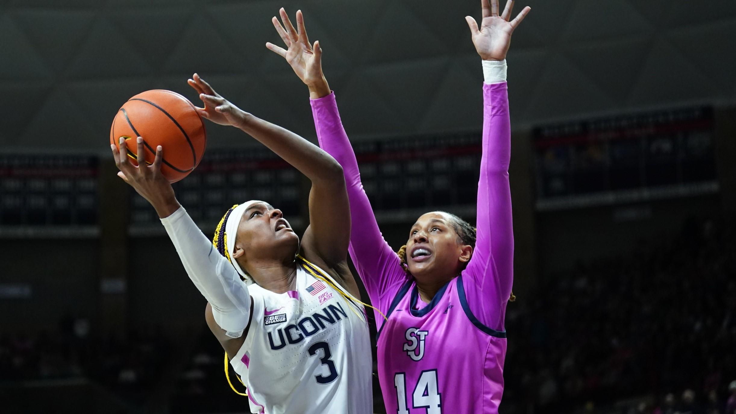 Feb 4, 2024; Storrs, Connecticut, USA; UConn Huskies forward Aaliyah Edwards (3) shoots against St. John's Red Storm forward Jillian Archer (14) in the first half at Harry A. Gampel Pavilion. / David Butler II-USA TODAY Sports