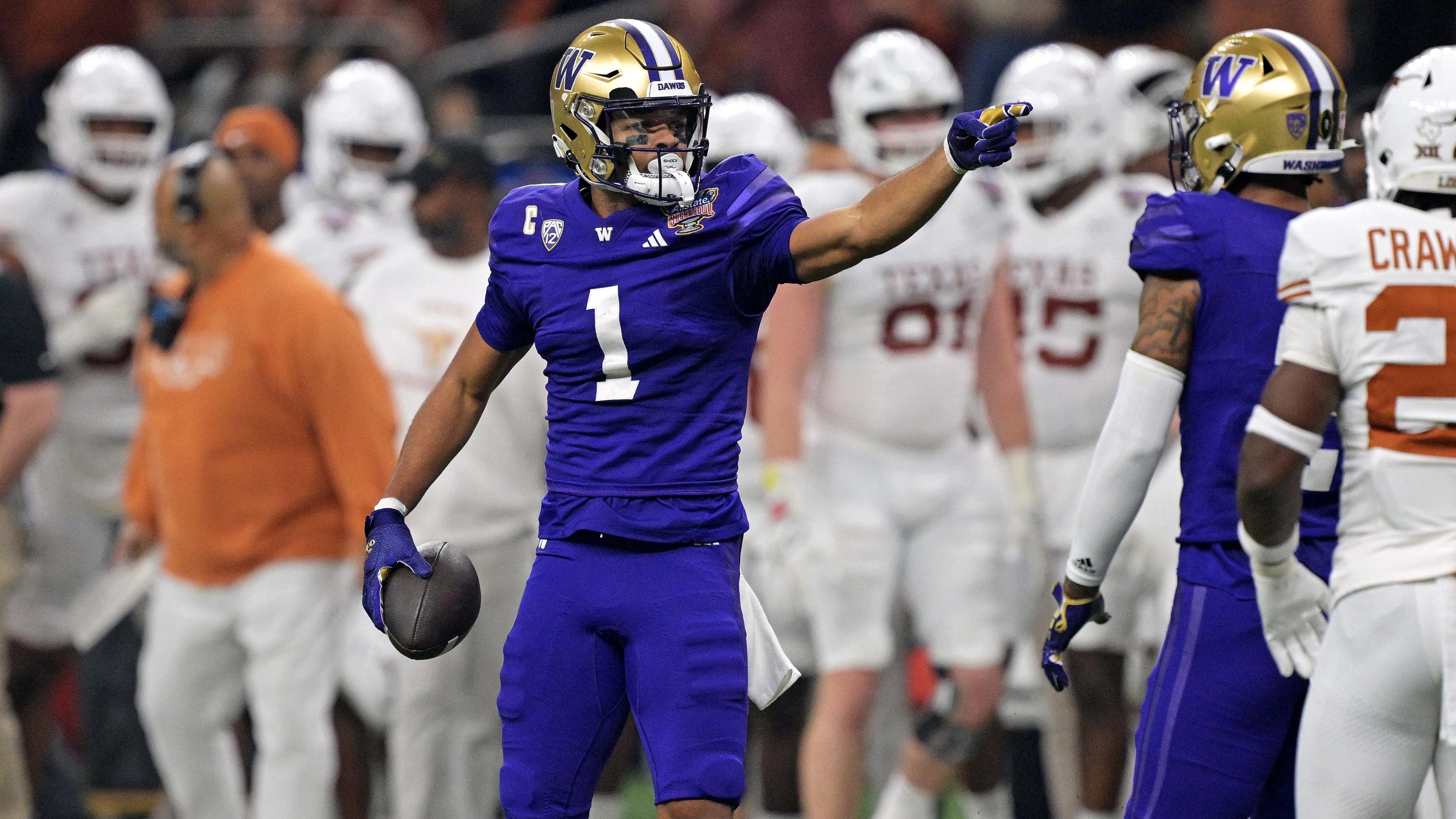 Washington Huskies wide receiver Rome Odunze (1) celebrates after a play during the second quarter against the Texas Longhorns in the 2024 Sugar Bowl college football playoff semifinal game at Caesars Superdome / Matthew Hinton - USA TODAY Sports