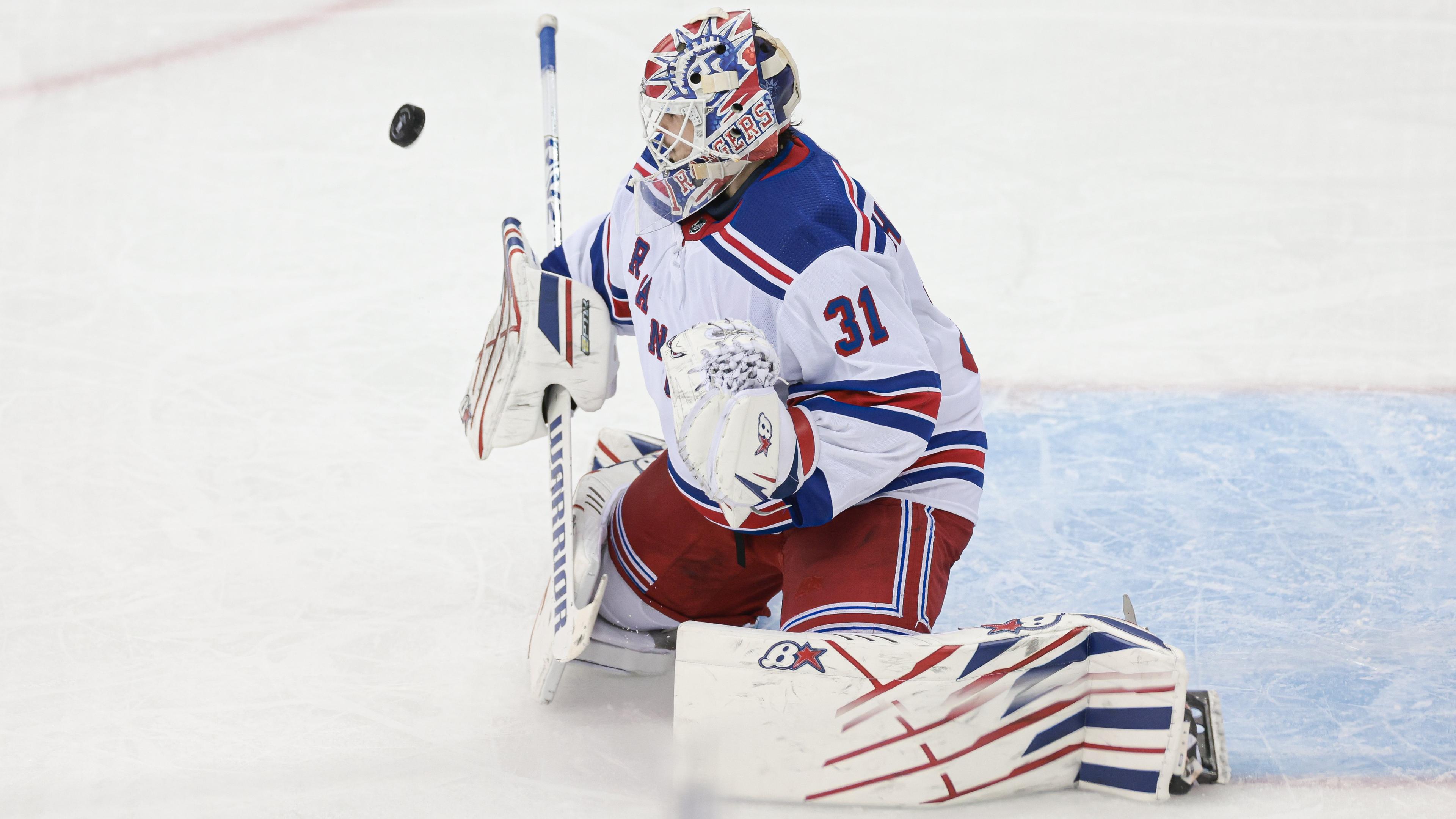 Apr 27, 2023; Newark, New Jersey, USA; New York Rangers goaltender Igor Shesterkin (31) makes a blocker save during the third period in game five of the first round of the 2023 Stanley Cup Playoffs against the New Jersey Devils at Prudential Center. / Vincent Carchietta-USA TODAY Sports