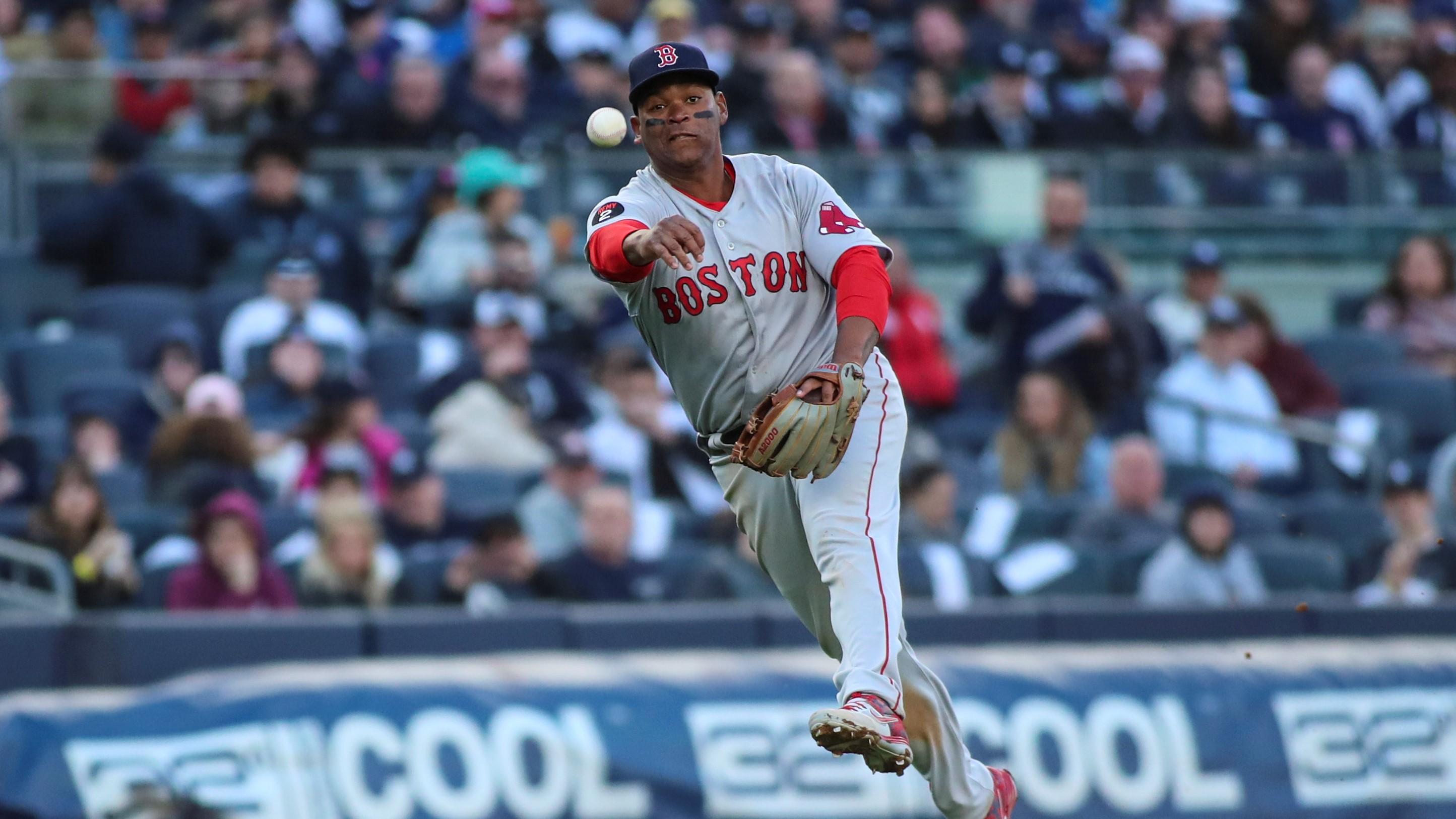 Apr 9, 2022; Bronx, New York, USA; Boston Red Sox third baseman Rafael Devers (11) makes a running throw to first base in the seventh inning against the New York Yankees at Yankee Stadium. Mandatory Credit: Wendell Cruz-USA TODAY Sports / © Wendell Cruz-USA TODAY Sports