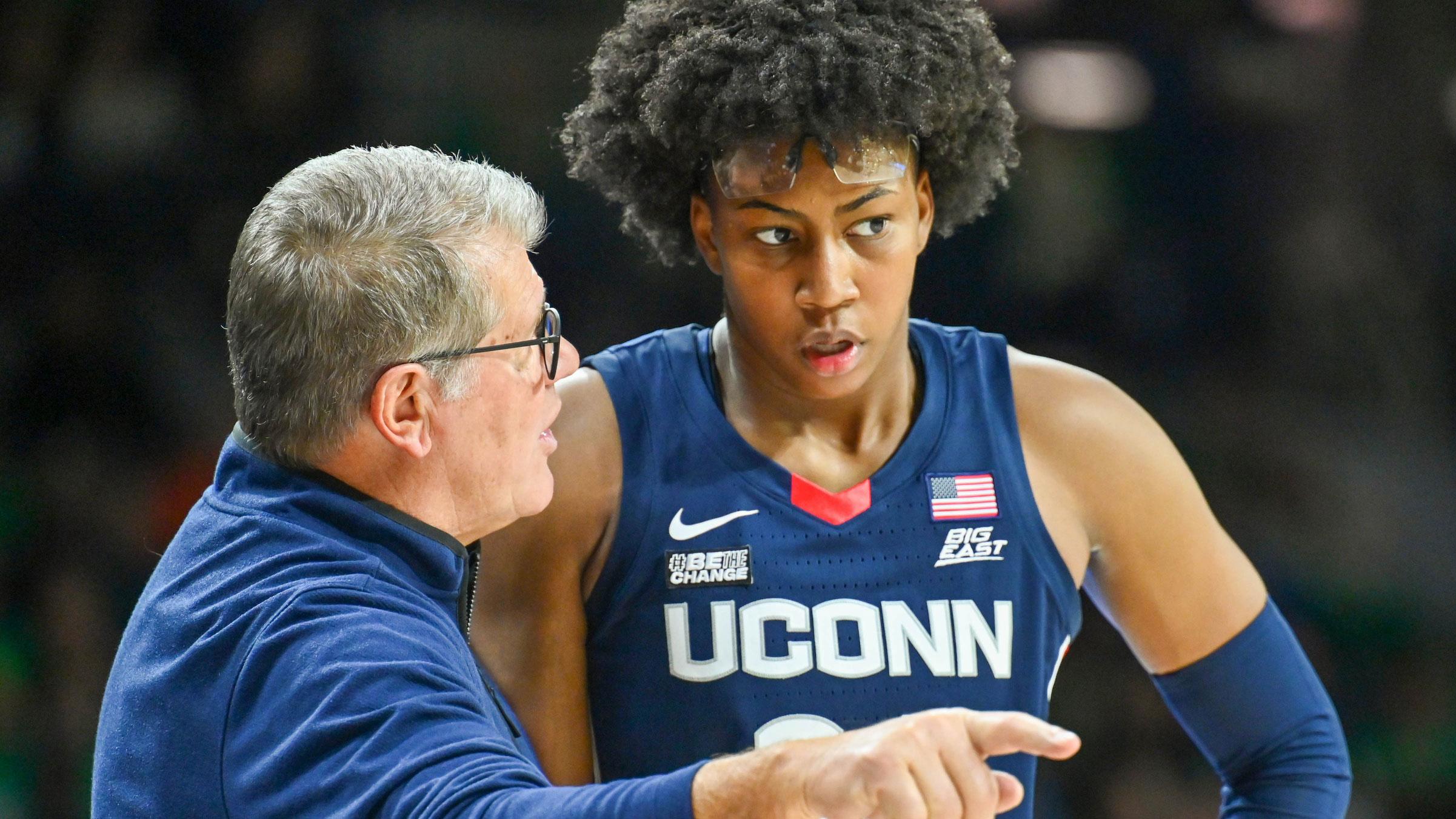 Dec 4, 2022; South Bend, Indiana, USA; Connecticut Huskies head coach Geno Auriemma talks to forward Ayanna Patterson (34) in the second half against the Notre Dame Fighting Irish at the Purcell Pavilion. / Matt Cashore-USA TODAY Sports