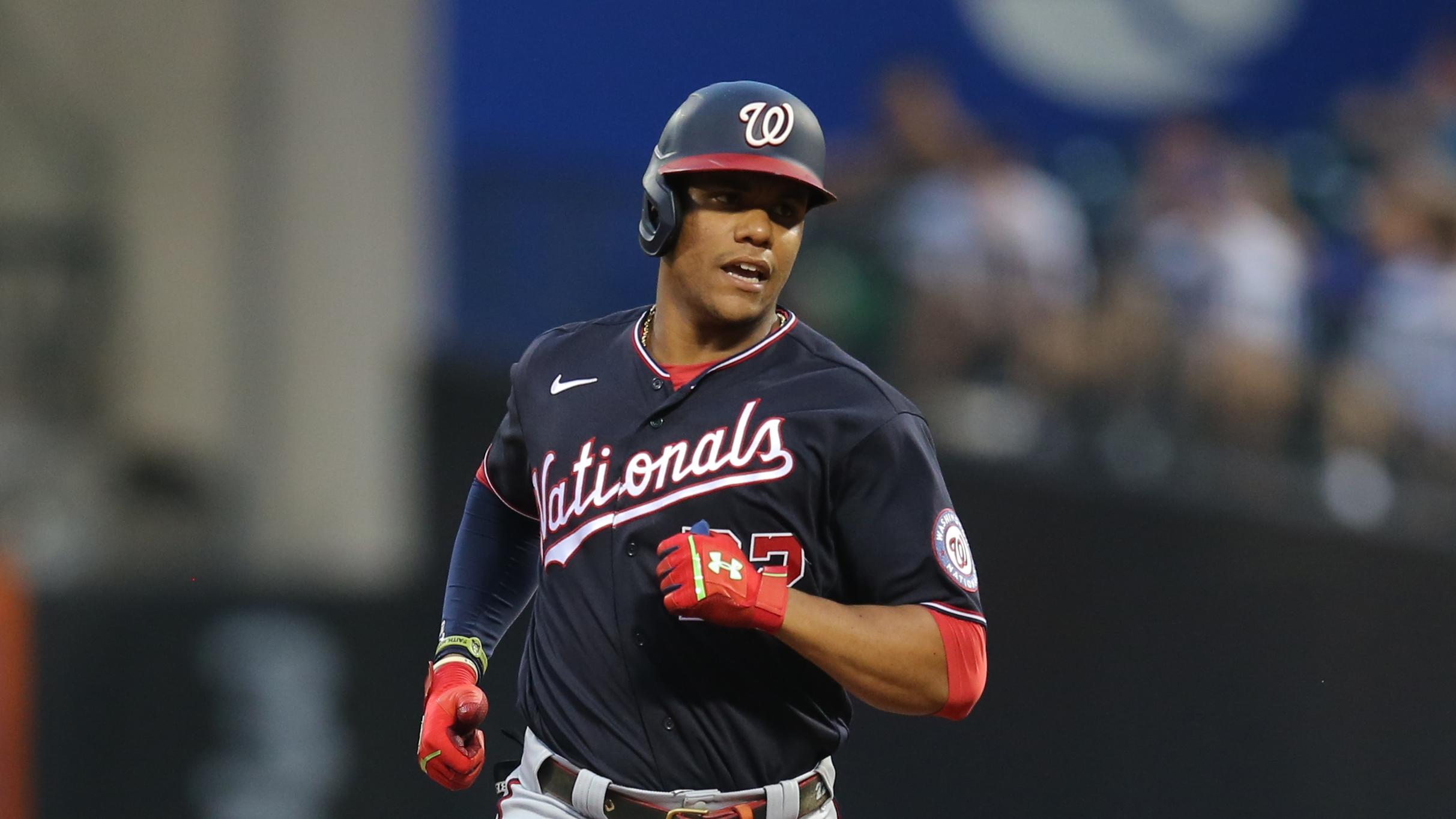 Washington Nationals right fielder Juan Soto (22) rounds the bases after hitting a three run home run against the New York Mets during the first inning at Citi Field. / Brad Penner-USA TODAY Sports