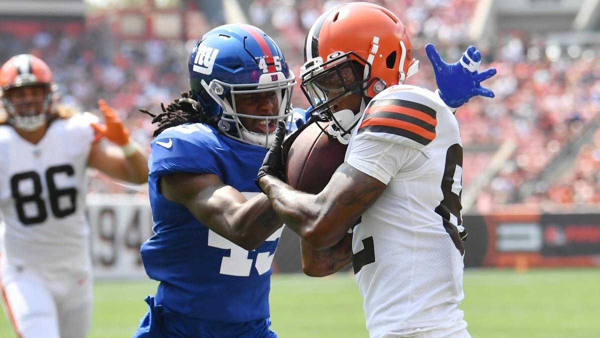 Aug 22, 2021; Cleveland, Ohio, USA; New York Giants cornerback Madre Harper (45) knocks the ball from Cleveland Browns wide receiver Rashard Higgins (82) during the first quarter at FirstEnergy Stadium. / Ken Blaze-USA TODAY Sports