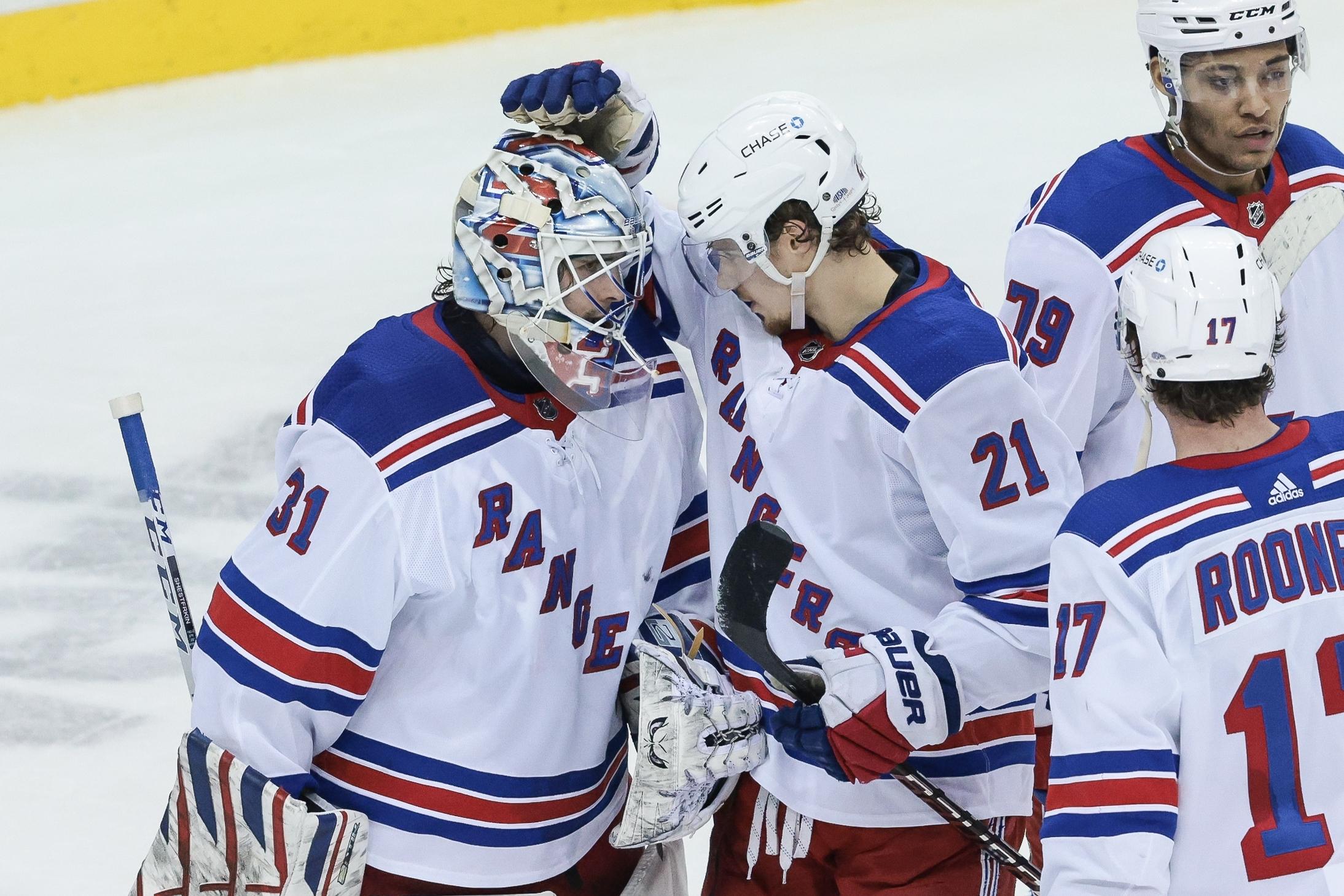 Apr 13, 2021; Newark, New Jersey, USA; New York Rangers goaltender Igor Shesterkin (31) is congratulated by center Brett Howden (21) after the game against the New Jersey Devils at Prudential Center. Mandatory Credit: Vincent Carchietta-USA TODAY Sports / Vincent Carchietta-USA TODAY Sports