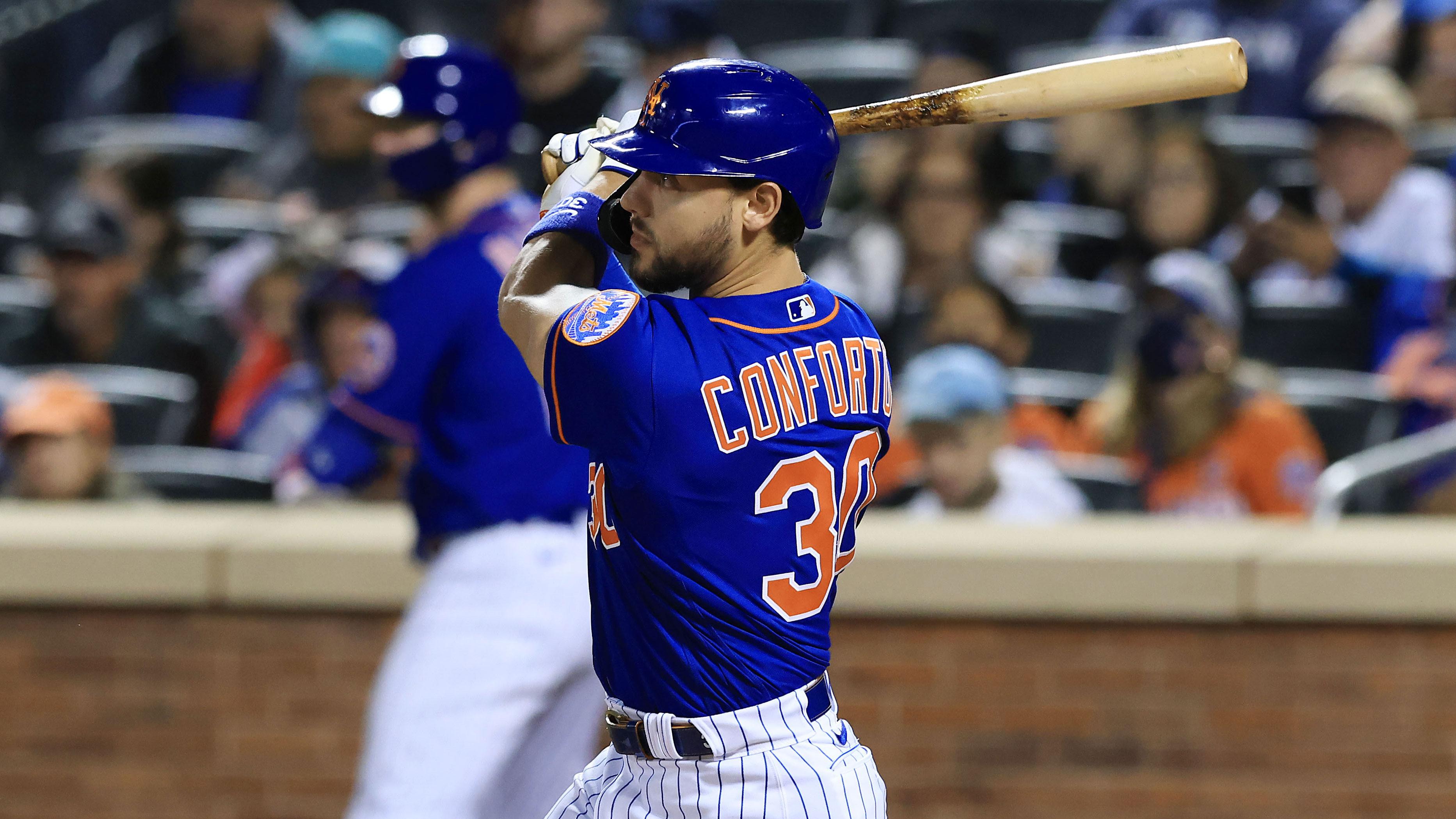 Sep 30, 2021; New York City, New York, USA; New York Mets right fielder Michael Conforto (30) hits an RBI single during the third inning against the Miami Marlins at Citi Field. / Vincent Carchietta-USA TODAY Sports