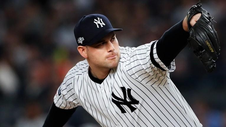 Oct 15, 2019; Bronx, NY, USA; New York Yankees relief pitcher Adam Ottavino (0) pitches during the seventh inning in game three of the 2019 ALCS playoff baseball series against the Houston Astros at Yankee Stadium. / Noah K. Murray-USA TODAY Sports