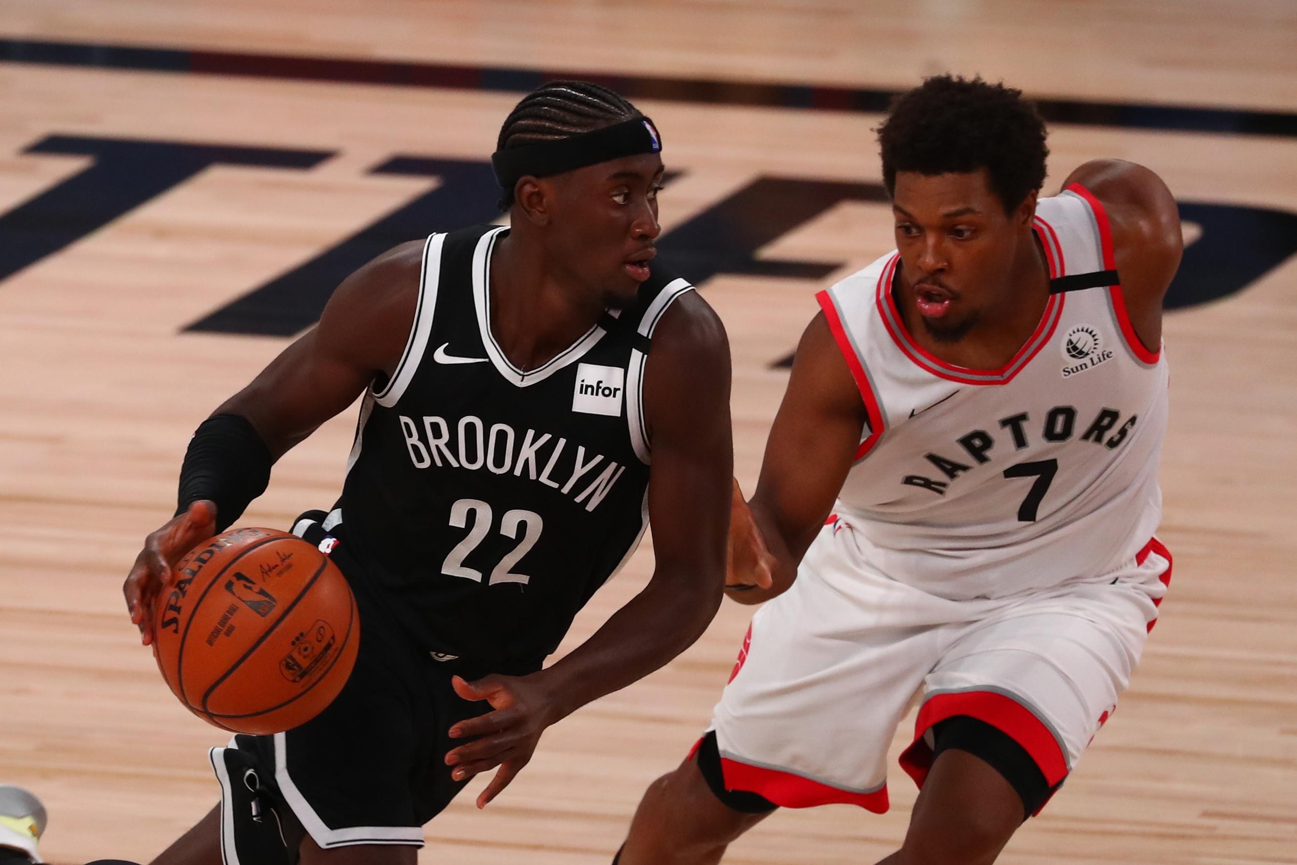 Caris LeVert drives to the basket against Kyle Lowry / USA TODAY