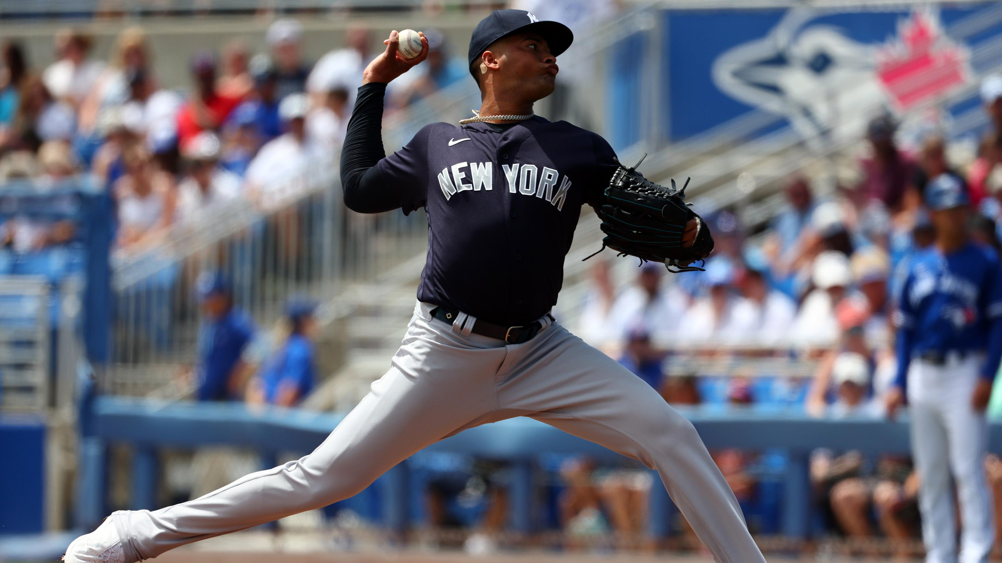Apr 3, 2022; Dunedin, Florida, USA; New York Yankees starting pitcher Luis Gil (81) throws a pitch during the first inning during against the Toronto Blue Jays spring training at TD Ballpark. / Kim Klement-USA TODAY Sports
